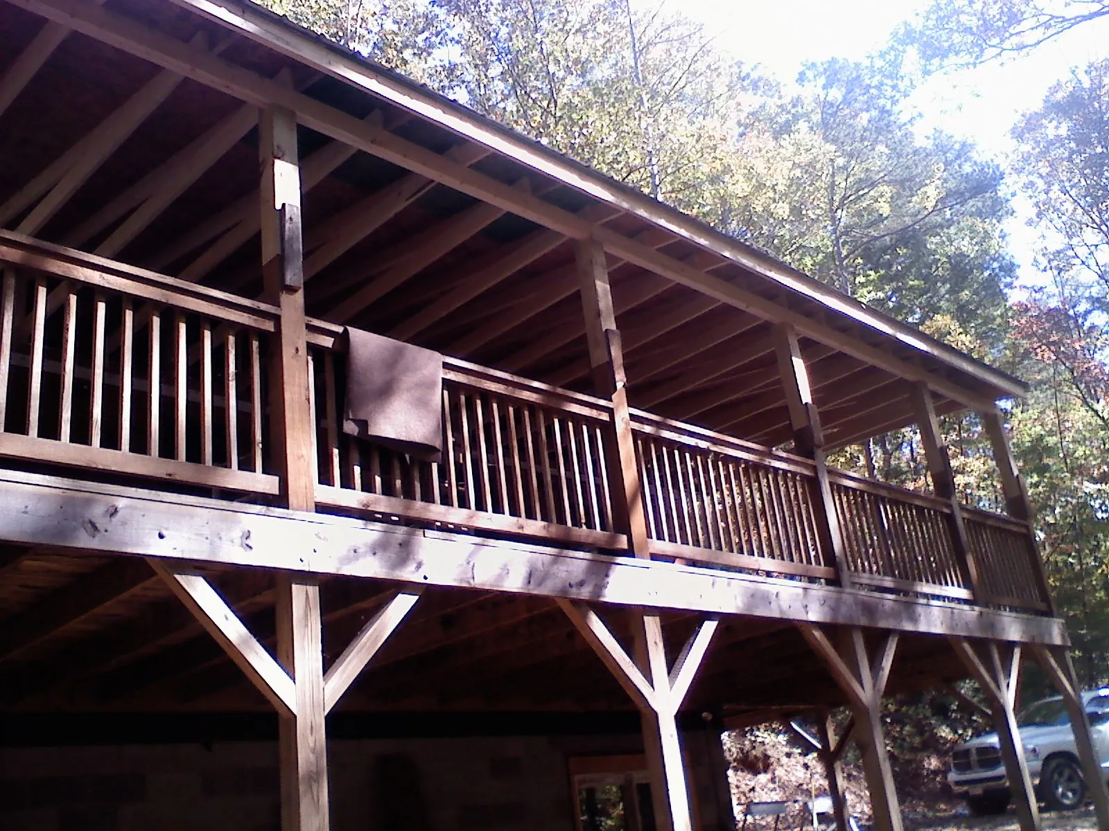 Timber framing under a new elevated porch and deck — Roof Leak Repair in Turner by Roofing Brothers